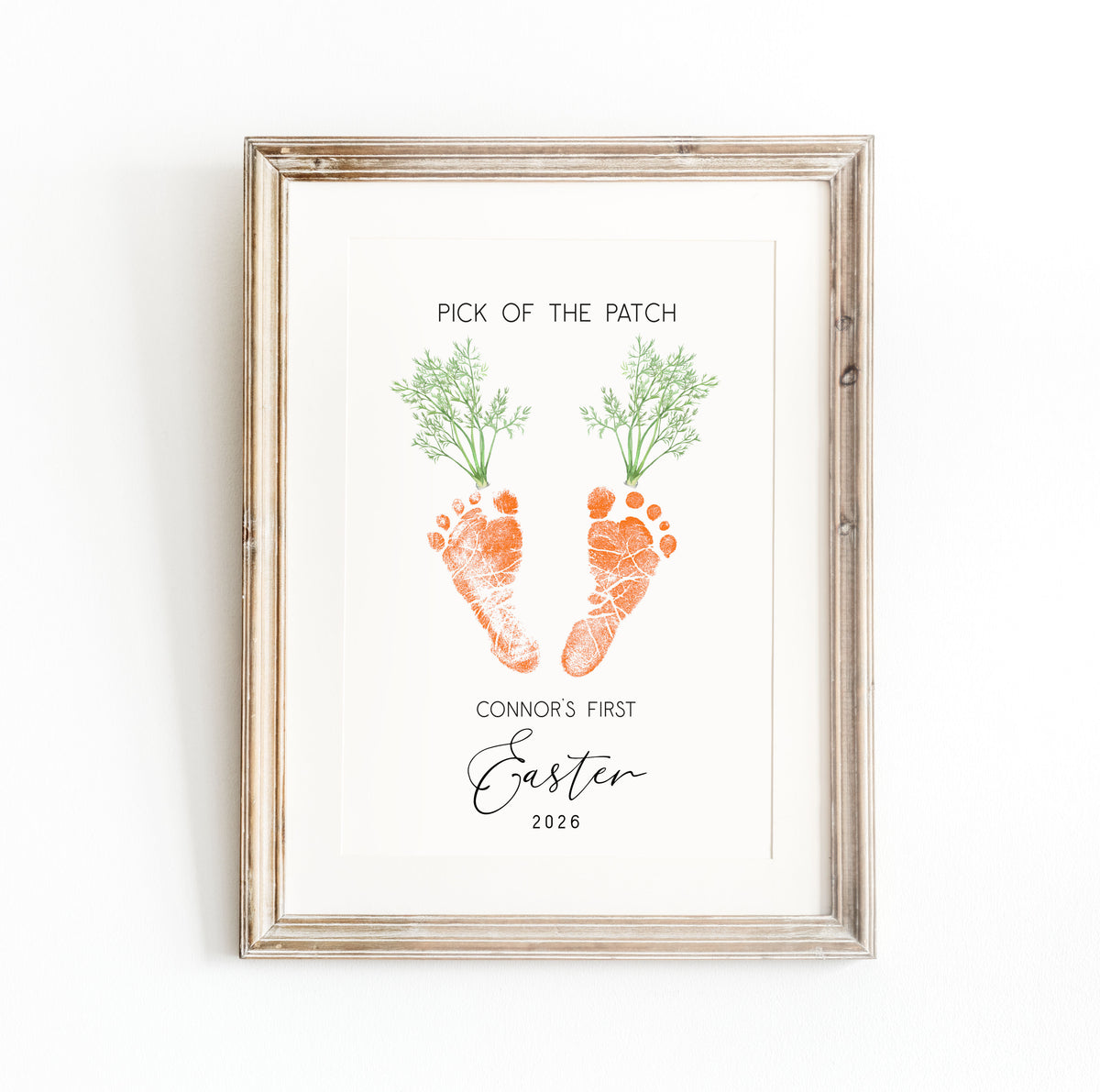 Framed keepsake with baby footprints and text on a white background
