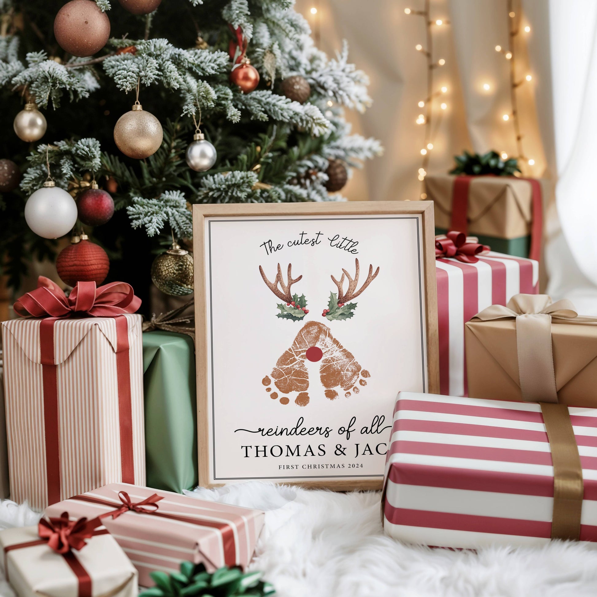 A Custom wallpaper baby footprint Christmas art framed by the tree