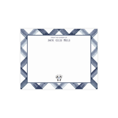 Card with zigzag border and text 'From the nursery of Jack Ellis Mills' on a white background with baby footprints.