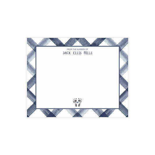 Card with zigzag border and text 'From the nursery of Jack Ellis Mills' on a white background with baby footprints.