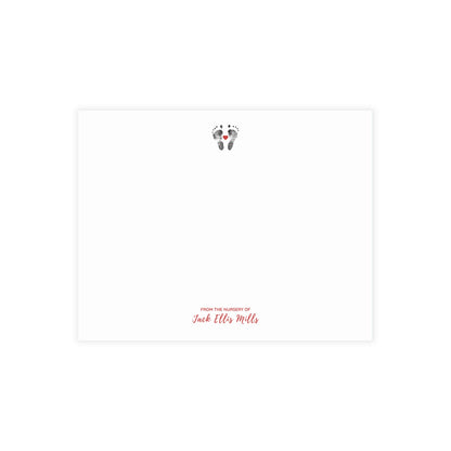 White card with baby footprints and 'From the Nursery of Jack Ellis Mills' text on a white background