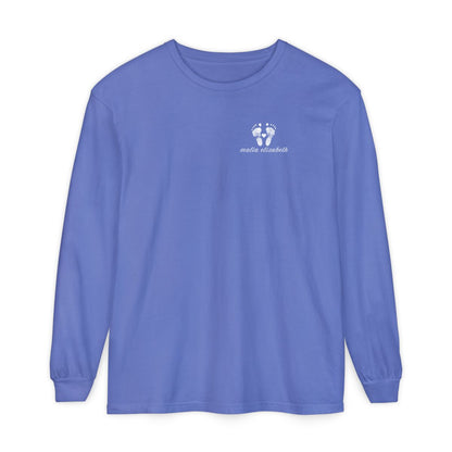 Flo Blue long-sleeve shirt with a baby footprint logo on the chest.