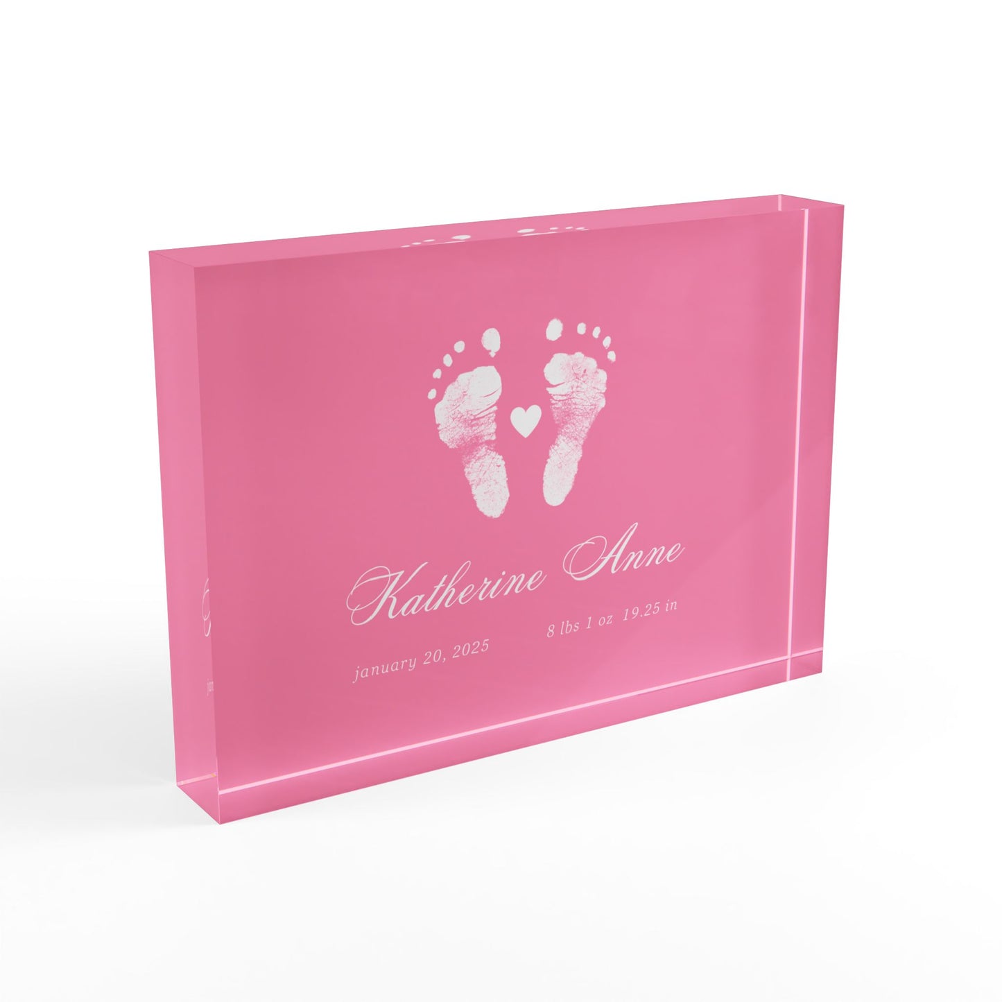 Pink acrylic block with white baby footprints and text_2