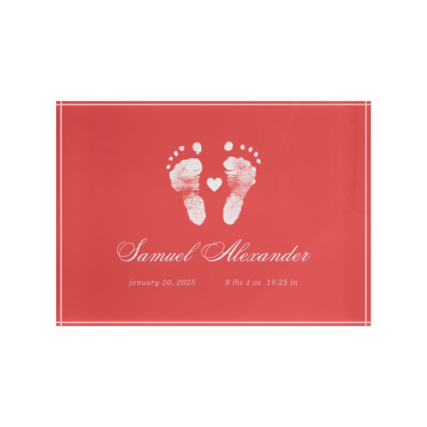 Red acrylic block with white baby footprints and text