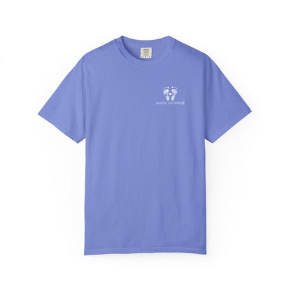 Flo blue t-shirt with a small baby footprint logo