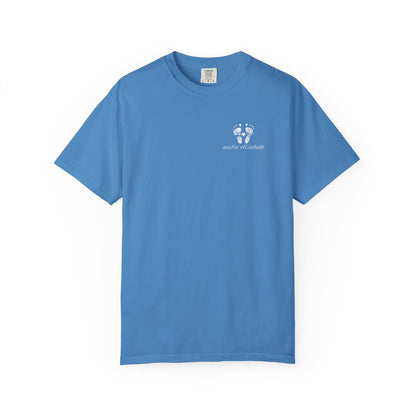 Royal caribbean t-shirt with a small baby footprint logo